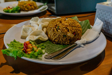 Indonesian Fried Rice with Crackers and Vegetables