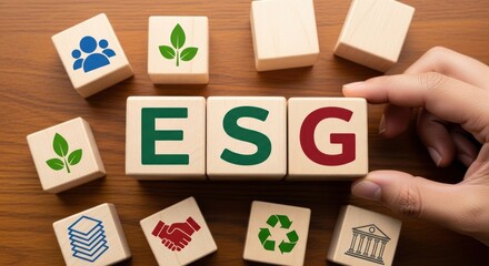 Esg concept with wooden blocks displaying environment social governance and hand on wooden background