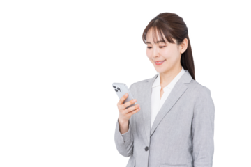 スマホを見るビジネスウーマン