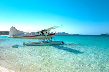 Seaplane for transporting tourists to the Whitehaven Beach is on Whitsunday Island.. The beach is...