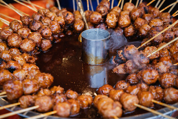 Street Food Style Saucy Meatballs on Sticks
