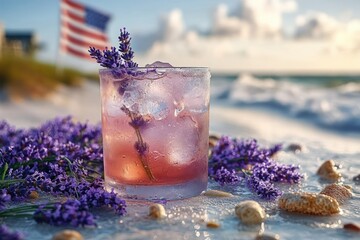 Refreshing pink cocktail with ice and lavender sprig on sandy beach surrounded by lavender flowers, seashells, and ocean waves under partly cloudy sky
