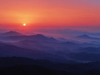 Obraz premium 朝焼けに染まる山並みの風景