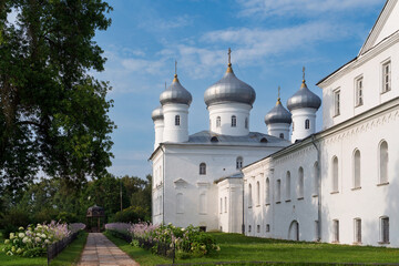 Church of the Nativity of Christ (Spassky Cathedral) of the St. George (Yuriev) Monastery and kivoriy (canopy over the spring of water) on a sunny summer day, Veliky Novgorod, Russia