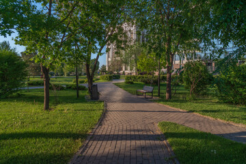 Friendship Park on the shore of Swan Lake on a sunny summer day, Astrakhan, Russia
