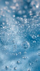 Fototapeta premium Fresh blue fluid with scattered water bubbles, clean aesthetics