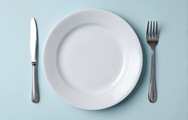 Top view of plate setting ready to eat, isolated on plain background. Stock photo