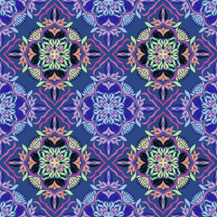 Beautiful seamless multi-colored flowers on blue