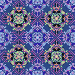 Beautiful seamless multi-colored flowers on blue