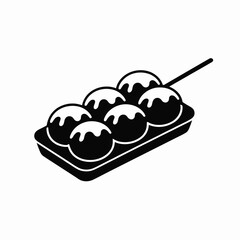 Delicious japanese takoyaki octopus balls served on a skewer in a tray