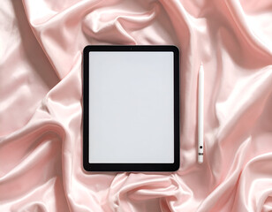 Firefly_Flat lay of a sleek stylus and digital touchpad on pastel pink satin, perfect for digital art and creative tasks.