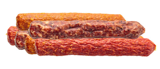 assorted smoked sausages stacked on transparent background