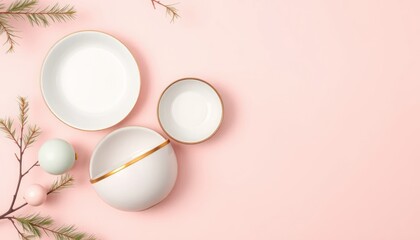 Elegant tableware arrangement with christmas decorations on pastel pink background