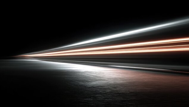 Two light trails on dark road
