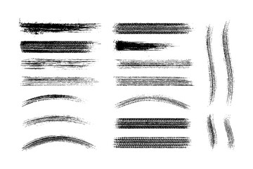 Set of black grungy tire tracks and abstract brush strokes with distressed textures, isolated on white&mdash;ideal for motorsport, urban design, and industrial-style backgrounds.