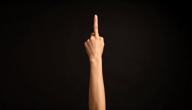 A fair-skinned hand is shown against a black background, making a rude gesture with the index finger extended