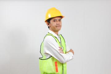 Portrait of a very confident young construction worker crossing his arms ready to build a...