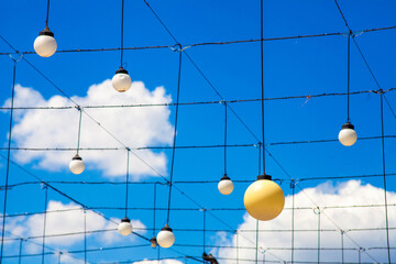 Flashlights with different colours in the town park