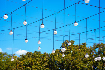 Flashlights in the town park in the afternoon