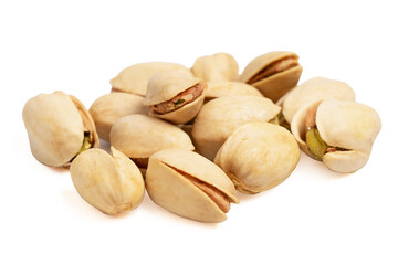 Pile of pistachios in the peel on white background