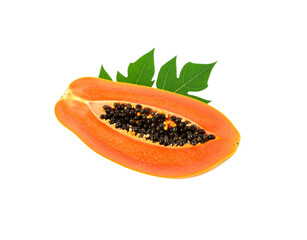 Half a ripe papaya with vibrant orange flesh black seeds and fresh green leaves.