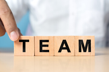 Naklejka premium Concept of team on wooden blocks