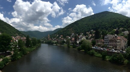 Fototapeta premium Serene River Valley Underneath Cumulus Cloudscape