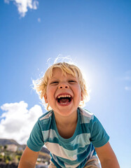 Children enjoying fun and freedom under a bright blue sky capturing carefree laughter and happiness in a cheerful environment