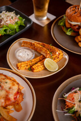 Barbecue corn ribs on table