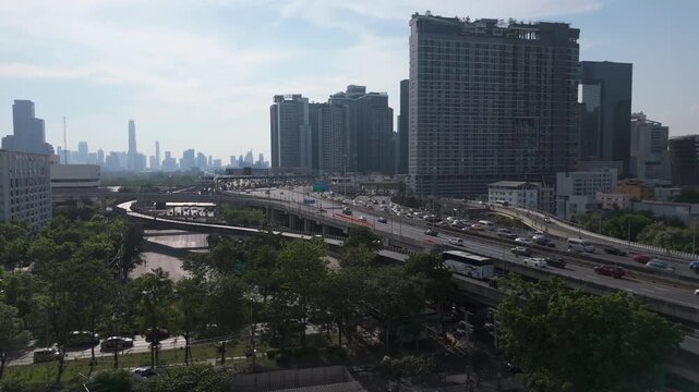 Busy Roads Of Si Rat Expressway At Sunset In Bangkok, Thailand. Aerial Drone Shot