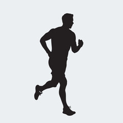 silhouette of a young man running
