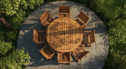Fototapeta premium Overhead view of a round wooden garden dining table and chairs outdoors