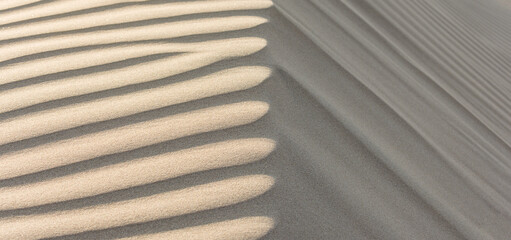 Obraz na płótnie Canvas desert sand lines and shadow