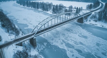 Aerial View: Winter Bridge Over Frozen River