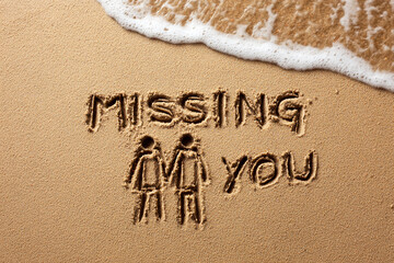 Fototapeta premium Missing You Handwritten in Smooth Wet Sand with Minimalist One-Line Couple Holding Hands Drawing Beside Gentle Wave – Horizontal Format for Romantic Posters