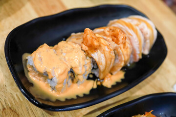 Top view of Japanese fresh salmon sushi with Japanese rice, focus selective
