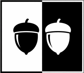 A symmetrical graphic design featuring two acorn illustrations, one in black and one in white.
