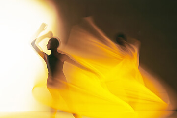 dance in the smoky golden light.