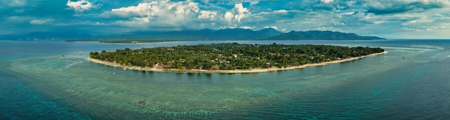 Aerial views of Gili Air captured in May 2025. Crystal-clear waters, coral reefs, and tropical coastline from above — showcasing the island’s serene beauty and vibrant marine life.