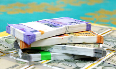 piles of new indian currency notes rupees 50,100,200 and 500