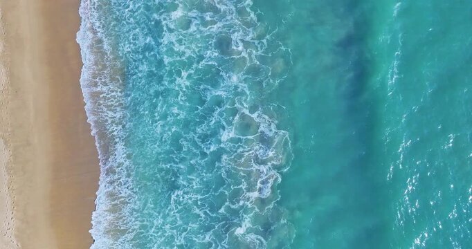 Crashing waves on beach top view,Aerial view waves sea Amazing ocean, Tropical beach sea in the beautiful Phuket island Thailand,Phuket island is destination tourist to travel Thailand