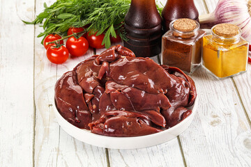 Raw chicken liver uncooked in the bowl