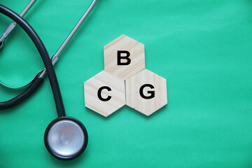 wooden cubes with text BCG. the medicine. medical concept