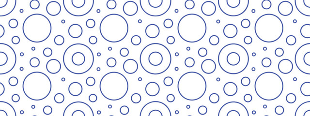 Seamless purple circle pattern background with white outlined rings in varying sizes. Modern minimal geometric texture perfect for wallpapers, wrapping paper, and stylish digital design projects.