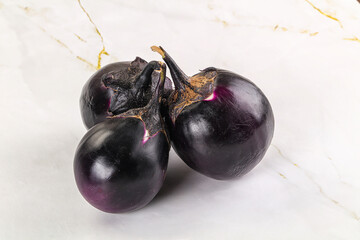 Raw violet and black eggplant