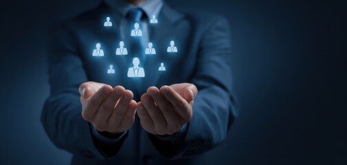 The businessman presenting a digital network of connected individuals in hands.