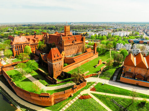 Teutonic Malbork castle in Pomerania region with Nogat river in Poland