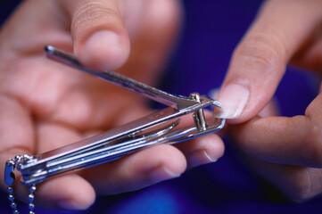 hand nail cutter cutting nails