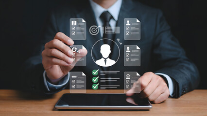 Man in suit using tablet with virtual documents and checklist interface overlay