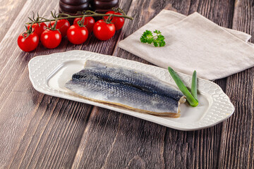 Salted herring fillet with skin